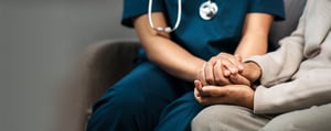 Patient and care giver hands